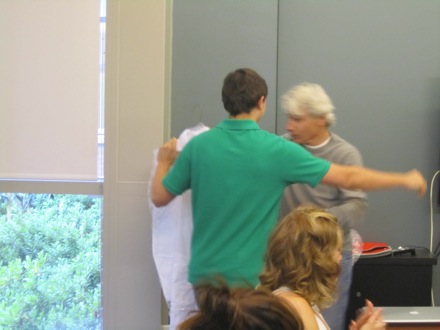 Reece gives Dr. Goldberg a hug during his white coat presentation.